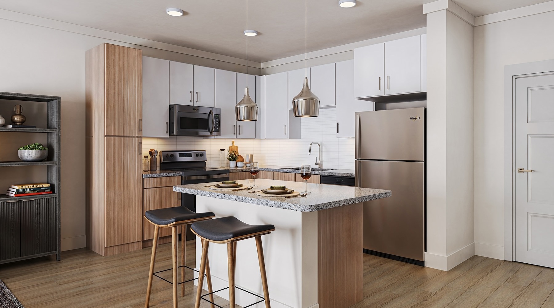 Spacious kitchens with thoughtful details Kitchen with island and white cabinets at Heritage Grove apartments in Broken Arrow, OK