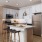 Kitchen with island at Heritage Grove apartment homes for rent in Broken Arrow, OK