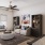 Living room with balcony at Heritage Grove apartment homes for rent in Broken Arrow, OK